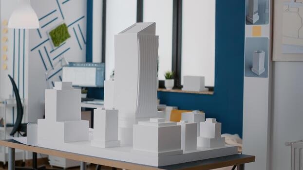 nobody-in-architectural-office-with-maquette-to-design-building-model-and-construction-empty-space-with-architecture-tools-used-to-plan-urban-layout-and-structure-for-development-photo